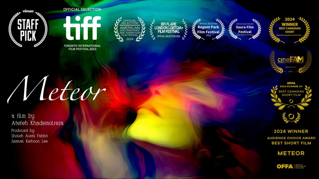 Poster image with woman's face and colours. Many film festival laurels are seen as well as the film's title Meteor